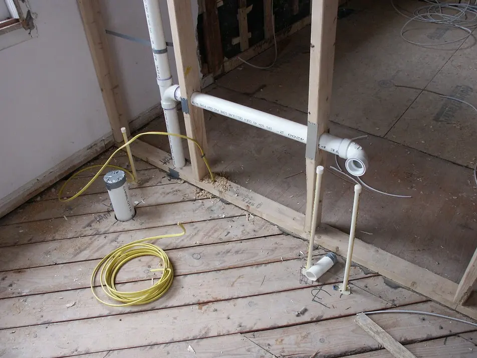 Rough-in plumbing during construction